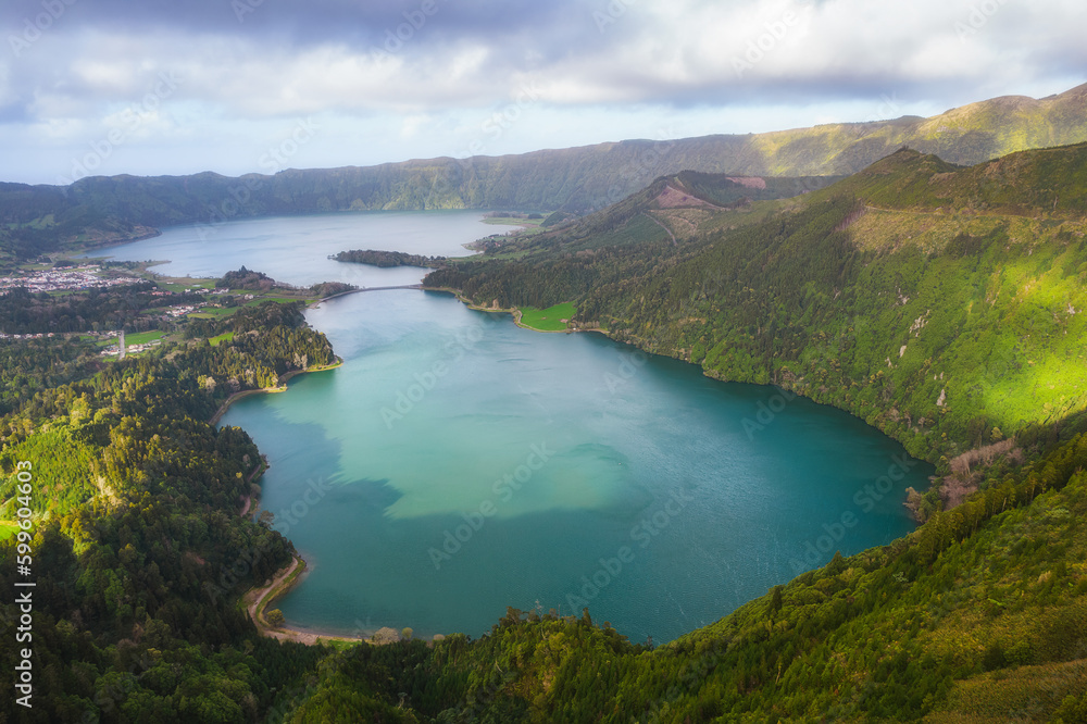 Aerial view of the volcanic mountains and lakes, with green farmland of Sete Cidades on Sao Miguel Island, Azores, Portugal