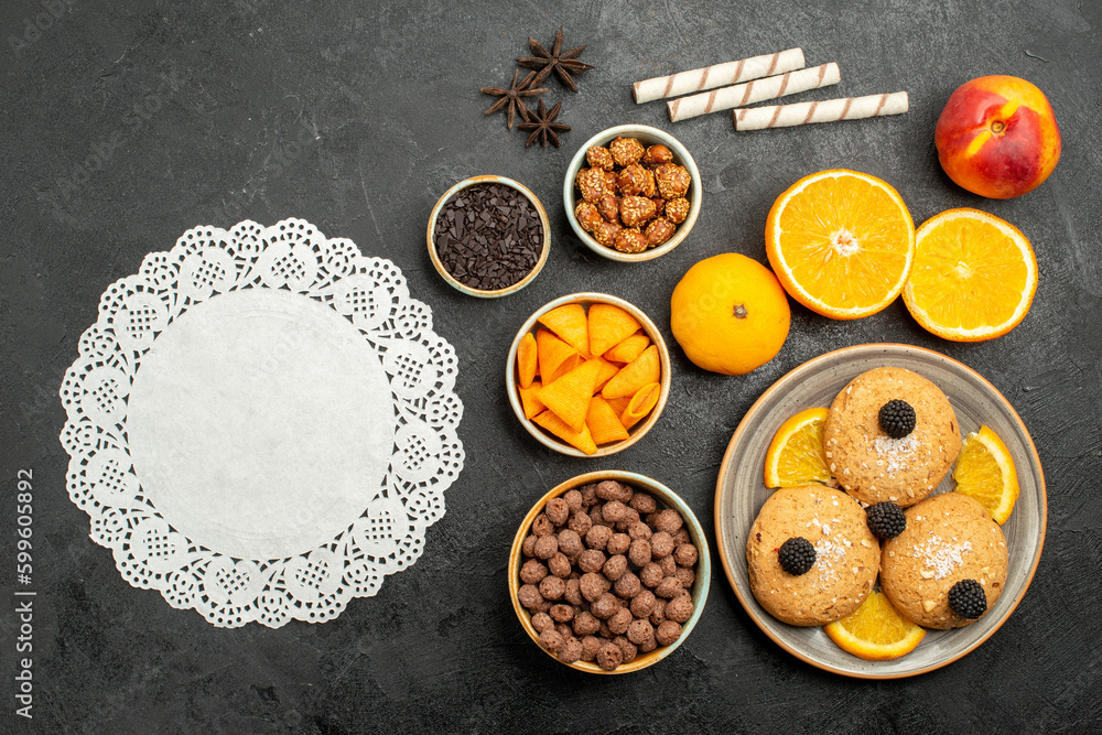 top view sand cookies with orange slices on dark-grey background sweet fruit biscuit cookies tea top view sand cookies with orange slices on dark-grey background sweet fruit biscuit cookies tea