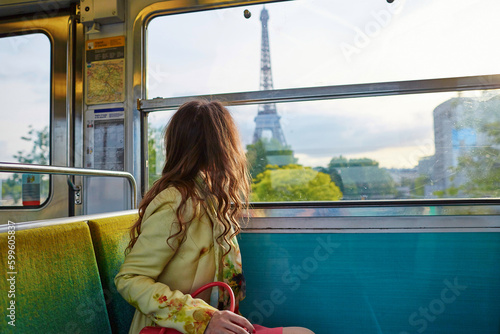 Canvas Print Beautiful young woman in Parisian metro