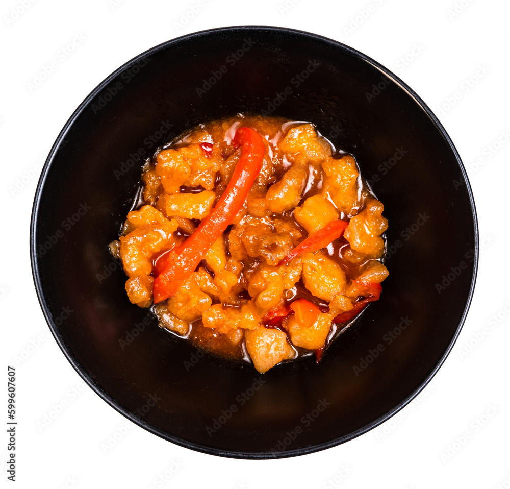 top view of vietnamese chicken in sweet and sour sauce with vegetables in bowl cutout on white background top view of vietnamese chicken in sweet and sour sauce with vegetables in bowl cutout on white background