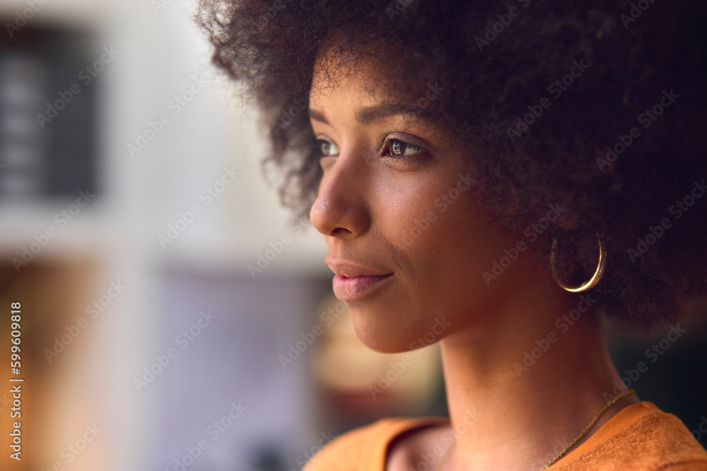 Close Up Portrait Of Young Smiling Businesswoman At Desk In Modern Office Close Up Portrait Of Young Smiling Businesswoman At Desk In Modern Office