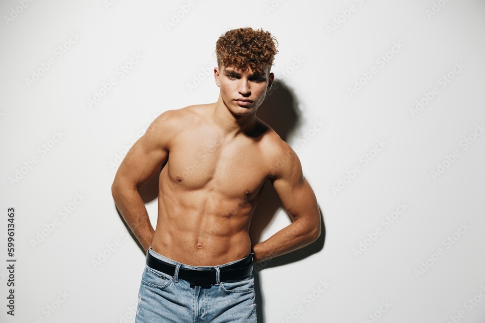 Fototapeta premium man care athlete gray background handsome fit strong sexy background person fitness chest