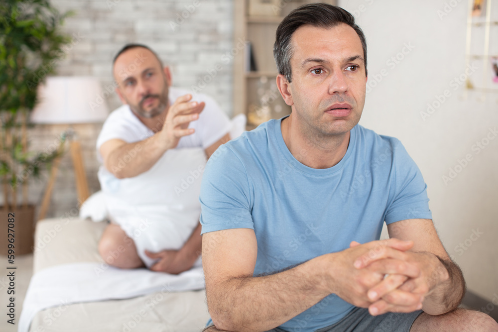 couple having argument with each other in bedroom couple having argument with each other in bedroom