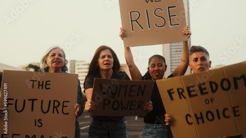 Demonstration of feminist movement protesting for female rights - Women empowerment concept