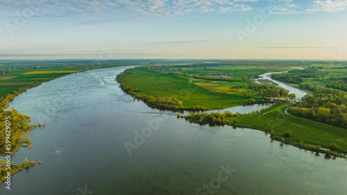 Floodgate in Biała Góra. Where the Nogat River flows from the Vistula. View from the drone, morning, spring. Poland. © Kamil