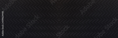 Black zigzag textured paper. Kraft paper texture sheet, absrtact background, wrapping texture. Dark texture of paper suitable for any design. Paper banner