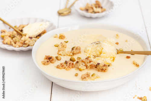 Lemoncurd mousse with pistachio crumble photo