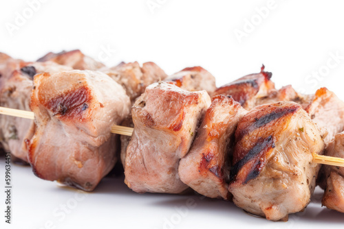 Grilled chicken meat skewer isolated on white background. Ai generative