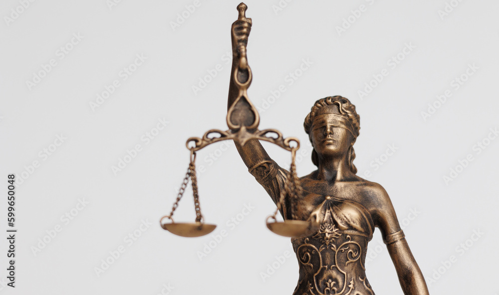 close up of Themis goddess of justice statuette on light background. symbol of law with scales and sword in his hands. legal company or university of law and judicial structure. bar association and close up of Themis goddess of justice statuette on light background. symbol of law with scales and sword in his hands. legal company or university of law and judicial structure. bar association and