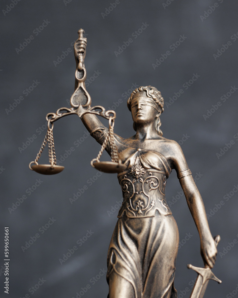themis is goddess of justice statuette on dark background. symbol of law with scales and sword in hands. legal company, university of law judicial structure. bar association human rights defenders themis is goddess of justice statuette on dark background. symbol of law with scales and sword in hands. legal company, university of law judicial structure. bar association human rights defenders