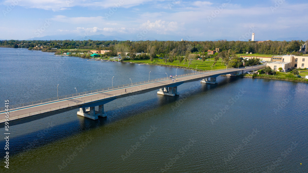 Aerial view of the large bridge that connects the city of Sabudia to the sea, in Italy.