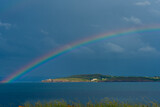 beautiful rainbows on the sea coast