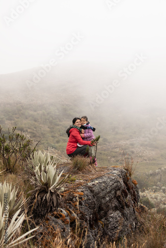 daughter and mother in the forest mountains