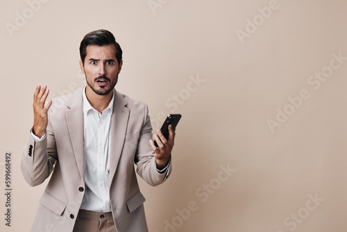hold man call business suit phone portrait happy smile smartphone cellphone