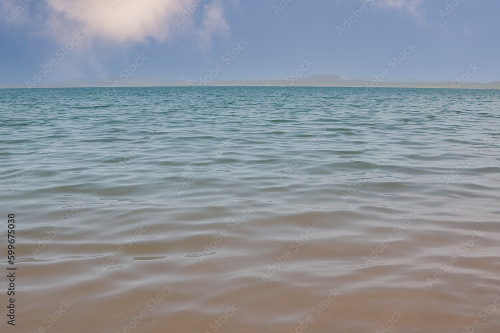 Water surface, sky and horizon line. With copy space.