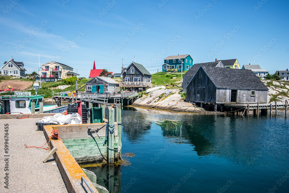 A boat docked in the bay of a fishing village at Peggy's Cove, Nova Scotia.