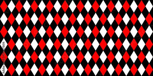 Harlequin seamless pattern in red, black and white colors. Argyle classic fabric design. Diamond or lozenge simple background. Joker geometric vector wallpaper. Venetian rhombus carnival ornament.