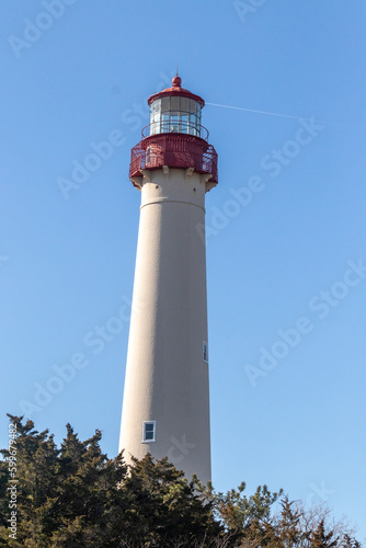 This is Cape May point lighthouse in New Jersey. I love the white look of its tower and the red top to it that stands out from so many.  This beacon of hope helps people at sea to navigate.