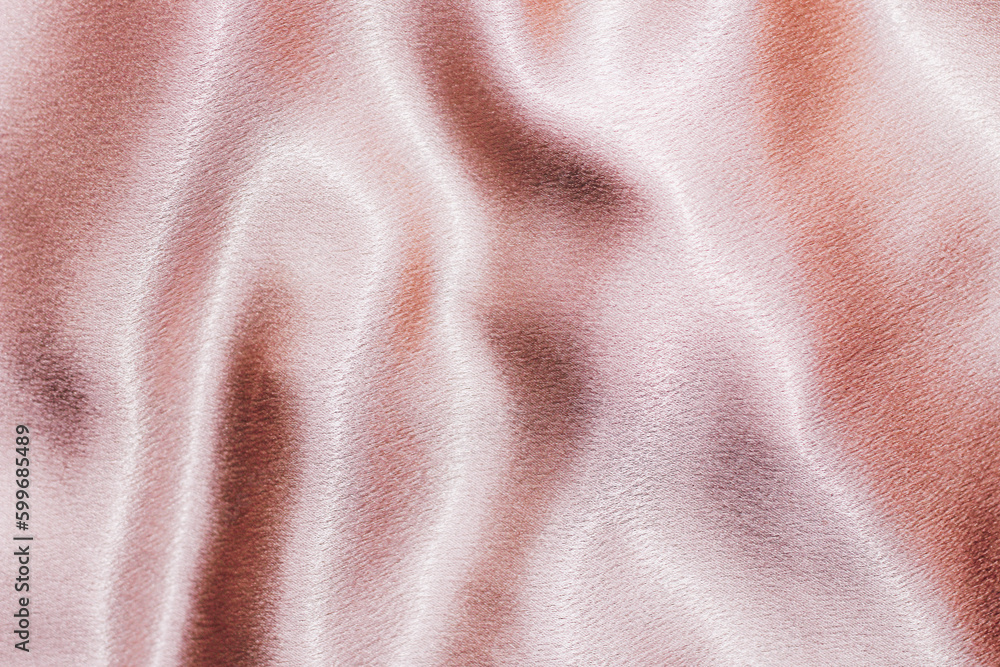 Pink shiny texture of silk satin satin with folds. Pink shiny texture of silk satin satin with folds.