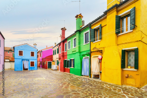 Colorful houses on Burano island, Venice Italy. Is an island in the Venetian Lagoon and is known for its lace work and brightly colored homes.