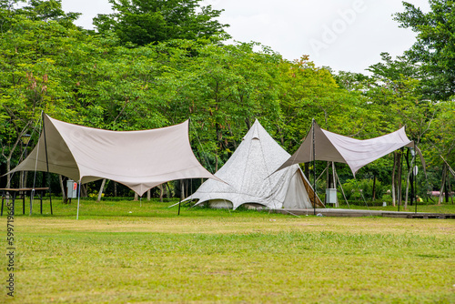 Camping tents on green grass in the park © zhonghui