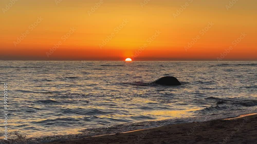 Scenic Handheld view over Baltic Sea and sandy beach in the evening Scenic Handheld view over Baltic Sea and sandy beach in the evening