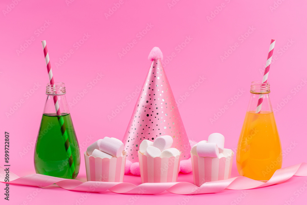 a front view white marshmallows along with drinks and birthday cap on the pink desk birthday party celebration a front view white marshmallows along with drinks and birthday cap on the pink desk birthday party celebration