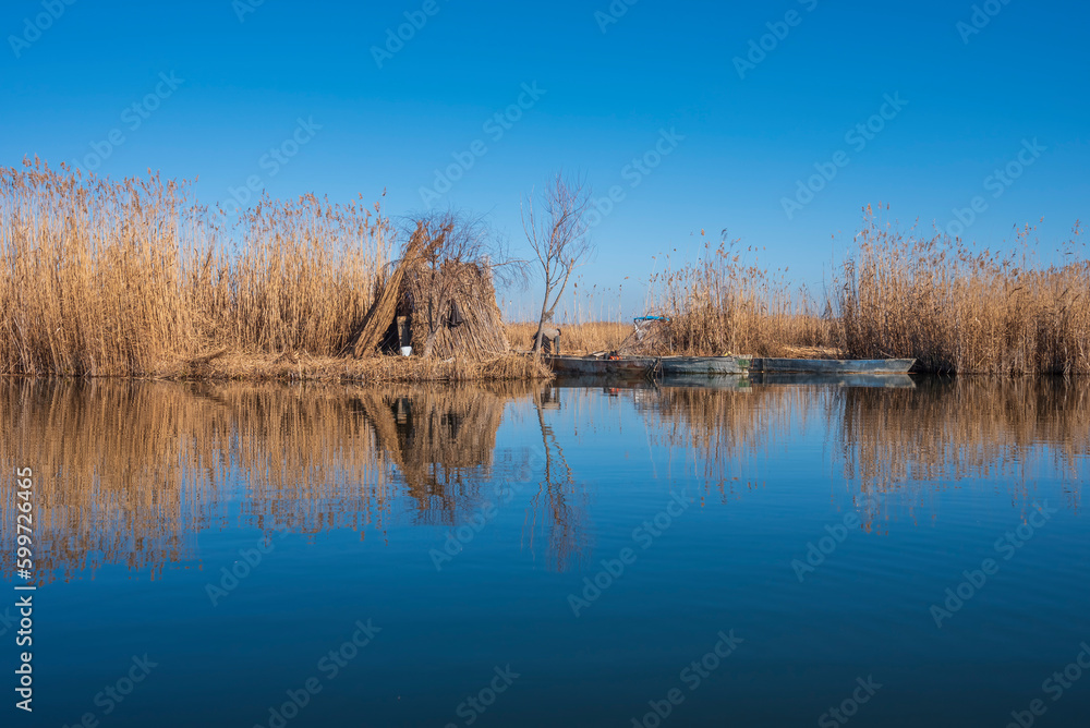 Reflected image of Eber lake and reeds in afyon province Reflected image of Eber lake and reeds in afyon province