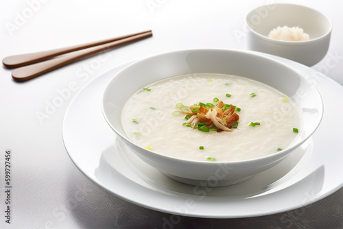 Chao Ga, Vietnamese rice porridge typically made with chicken, ginger, and scallions Generative AI