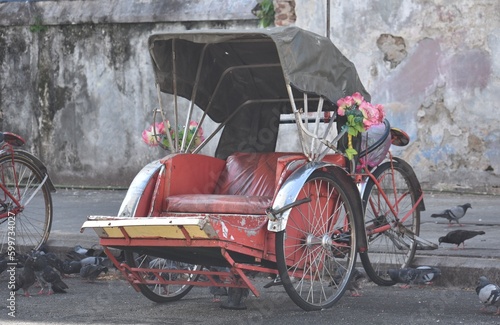 Decorated rickshaw on the street in Penang, Malaysia