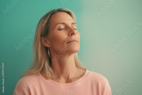 Medium shot portrait photography of a woman in her 40s practicing mindfulness, sophrology, relaxation & stress-reduction wearing a cozy sweater on pastel background. Generative AI © Robert MEYNER