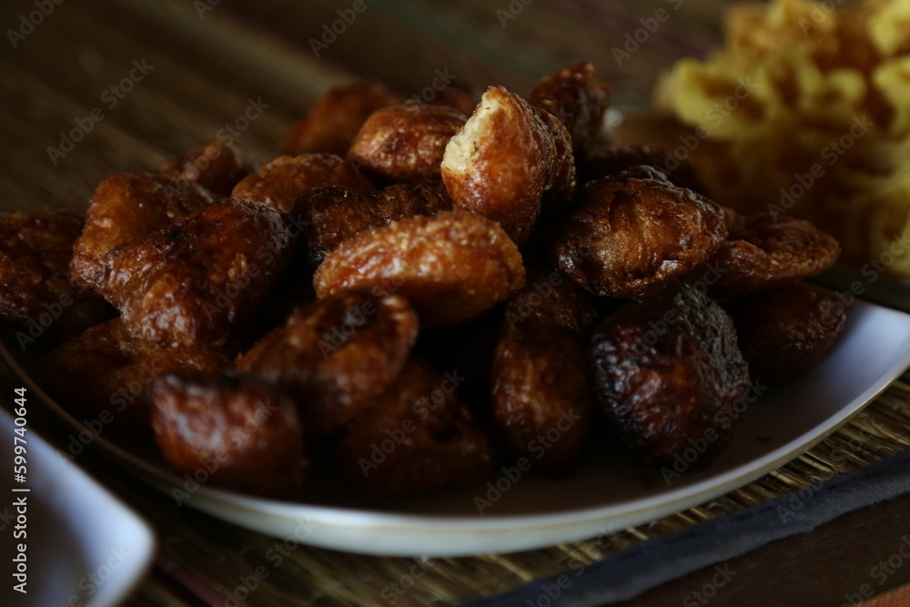 Sri Lankan traditional sweet oil cake or kaum on the plate Sri Lankan traditional sweet oil cake or kaum on the plate