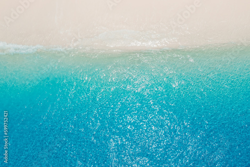Tropical beach and crystal blue ocean. Aerial view of holidays beach in Maldives