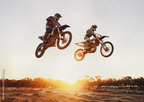 Canvastavla Motorbike, jump and adventure during race for competition as transportation with sunset