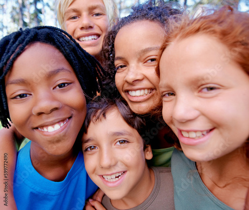 Portrait, diversity and group with happiness, outdoor and teamwork with joy, wellness and kids with support. Face, young people and friends on a weekend break, multiracial and playful at summer camp photo