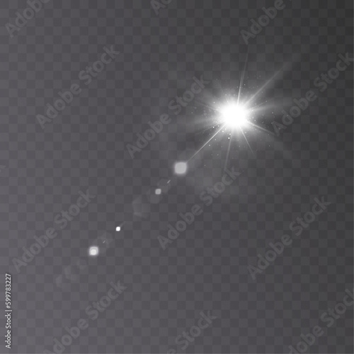 The glowing light explodes, the light flashes with a cold color. Beam of the shining sun. Special glare light effect. Bright flash.