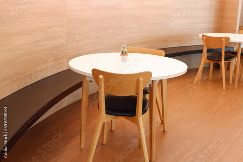 Modern designed wooden table and chairs set.