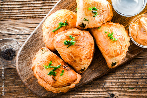 Composition with a plate of oven-baked pierogi