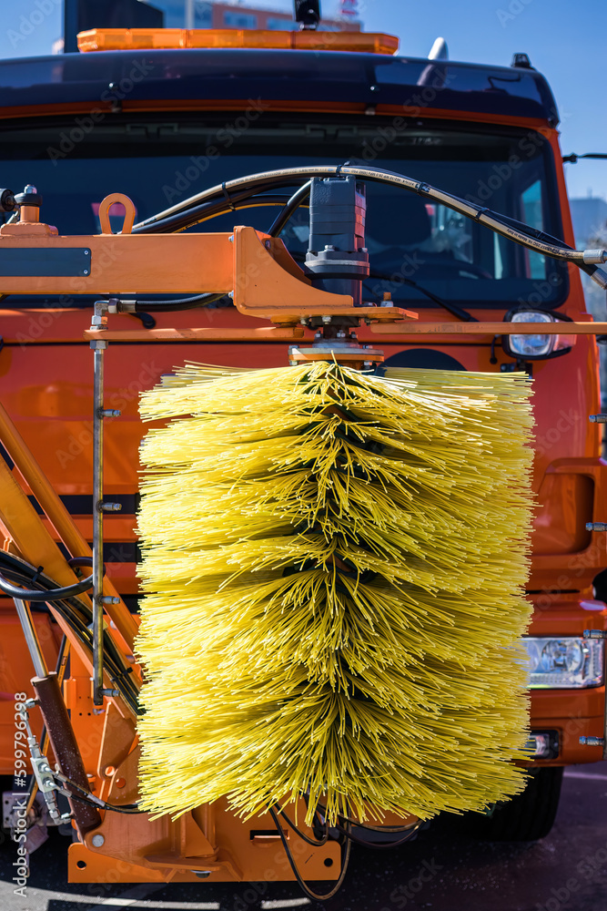 rotating brush for cleaning fences and walls on the sweeper vehicle