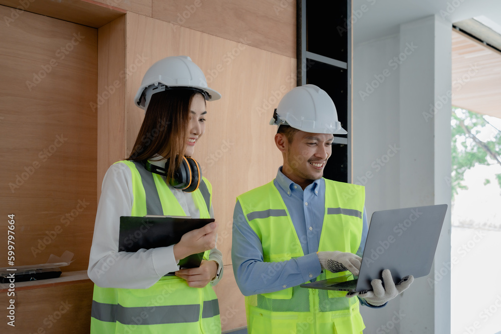 multi ethnic engineer brainstorming and measuring for cost estimating on blueprint and floor plan drawings about design architectural and engineering for houses and buildings multi ethnic engineer brainstorming and measuring for cost estimating on blueprint and floor plan drawings about design architectural and engineering for houses and buildings