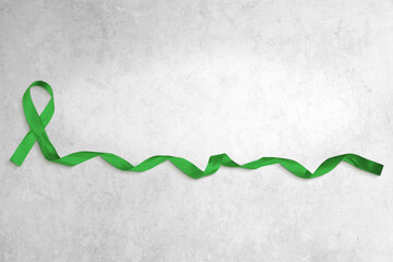 Green Ribbon, Mental Health, Glaucoma Awareness with Copy Space