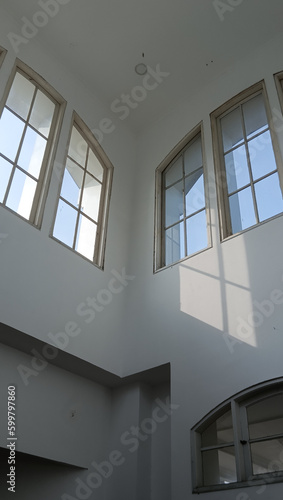 classic white windows with sunlight reflection