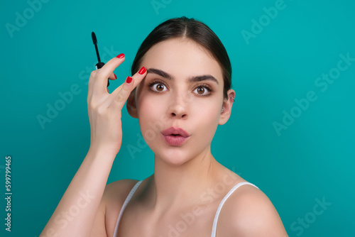 Beauty eyelashes. Natural beauty lashes. Eyelashes coloring and lamination. Woman combing lashes. Makeup and cosmetology concept. Eyelashes shape modeling.