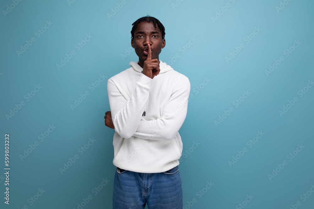 inspired black american young brunette man with brilliant idea
