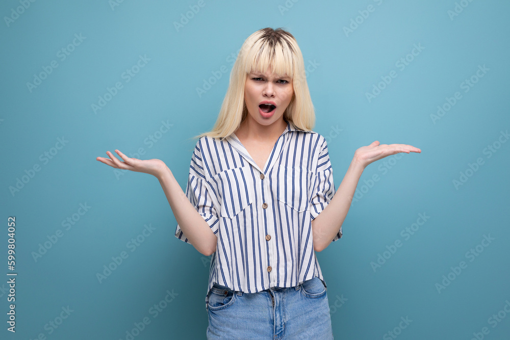 upset blonde 25 year old female person in striped blouse and jeans upset blonde 25 year old female person in striped blouse and jeans