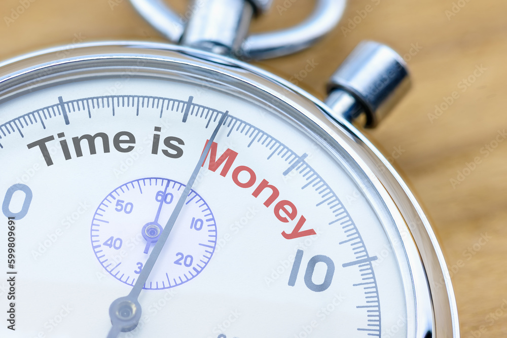 Time is money, financial concept : Closeup of a stopwatch with the word Time is Money. Time is a valuable resource, and wasting time is the same as wasting opportunity to earn money or achieve goals. Time is money, financial concept : Closeup of a stopwatch with the word Time is Money. Time is a valuable resource, and wasting time is the same as wasting opportunity to earn money or achieve goals.