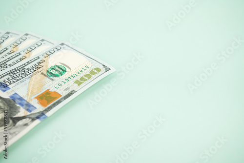 American dollars banknotes cash on a green background, copy space, money, bank deposits, taxes, bribes