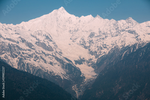 Beautiful sunrise landscape of meri snow mountain in Yunnan,China photo