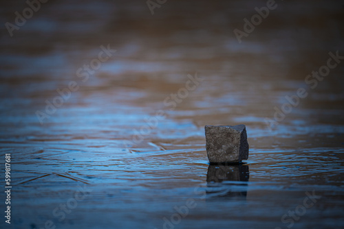 Stein auf dem Eis des Stendaler Stadtsee`s photo