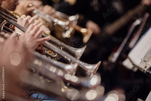 Trumpet bells of a large trumpet section in a wind ensemble or wind band